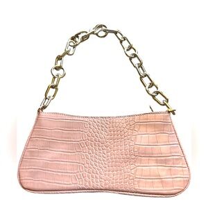 A New Day dainty purse with silver chain strap. Perfect for an evening out!